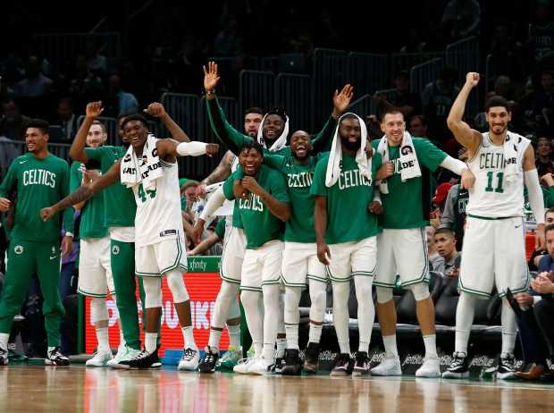 Celtics Playoff Preview and Predictions - BOSTON, MA. - OCTOBER 13: The Boston Celtics bench cheers after Tacko Fall scored during the second half of an NBA preseason game against the Cleveland Cavaliers on October 13, 2019 in Boston, Massachusetts. (Photo By Mary Schwalm/MediaNews Group/Boston Herald)