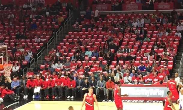 The empty Clipper seats, showing lack of fans at a playoff game .Which is why they need to relocate