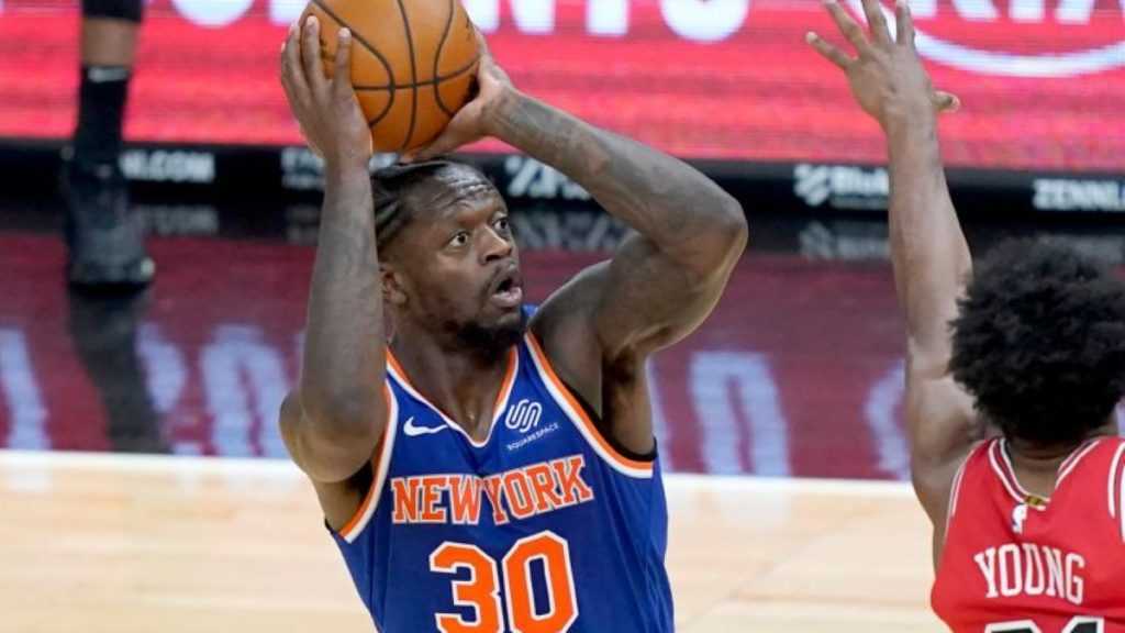 Julius Randle lets if fly from three for the Knicks.