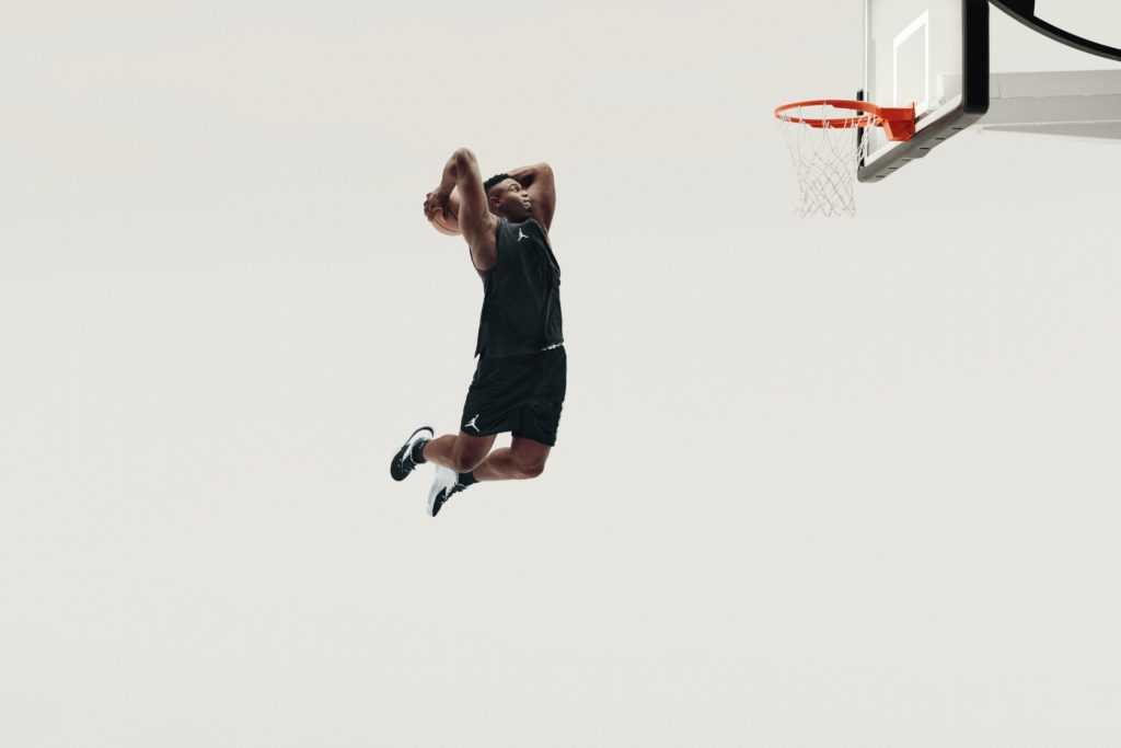 Zion showing off his new shoes by flying through the air.