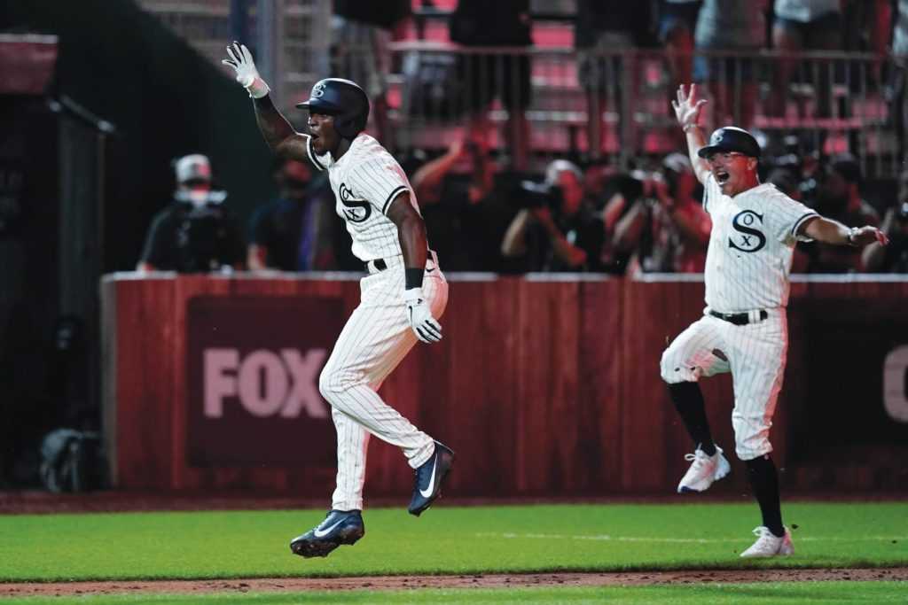 Tim Anderson celebrates a walk off home run at the Field of Dreams game.
