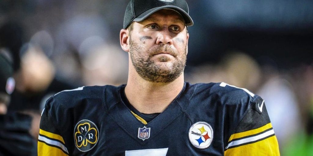 Steelers quarterback Ben Roethlisberger looking upset with his helmet off during a game. "pictured here"