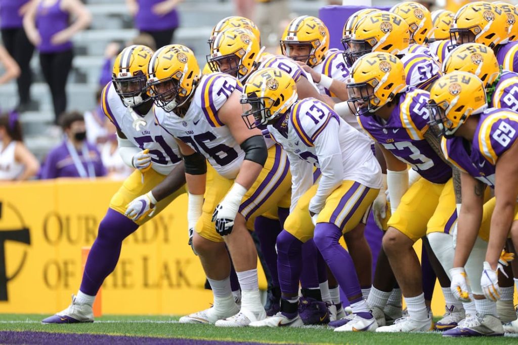 LSU football team getting ready to run onto the field prior to the start of a game. "pictured here"