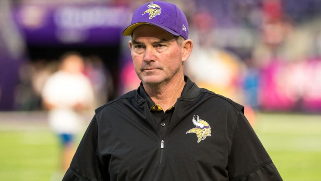 Vikings head coach Mike Zimmer walking the field during a game. "pictured here"