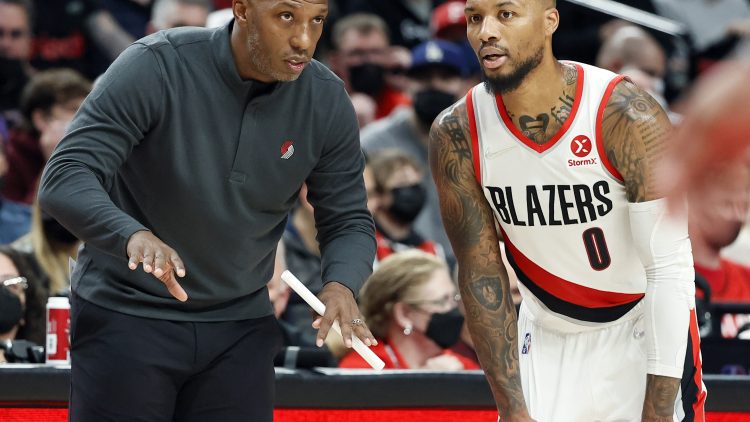 Chauncey and superstar guard Damian Lillard plot during a break in action.