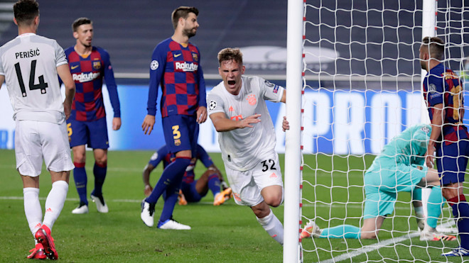 Bayern midfielder Joshua Kimmich celebrates scoring in 8-2 win over Barcelona.