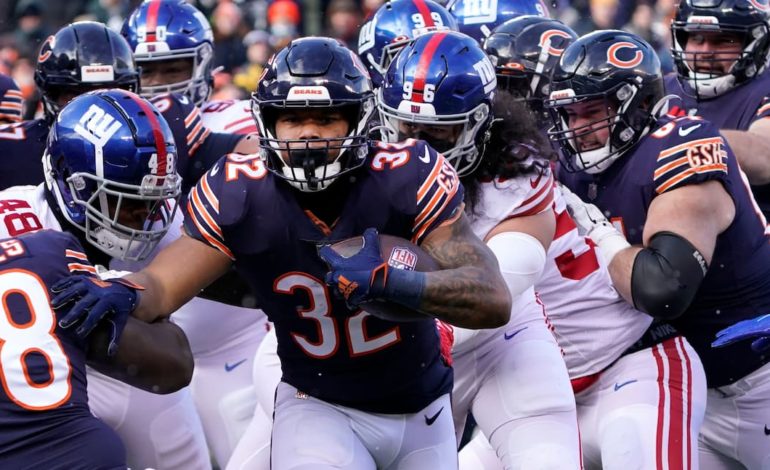 Chicago Bears running back David Montgomery breaks through the lines of scrimmage in the game versus the New York Giants this last Sunday. "pictured here"