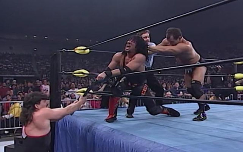 Eddie Guerrero tries to prevent Syxx from cheating to beat Dean Malenko