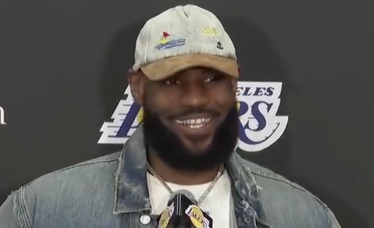 LeBron smiles at the media