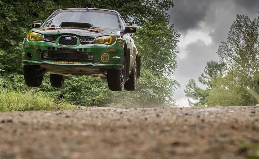 Ojibwe Forests Rally Dave Carapetyan’s Subaru Jumping