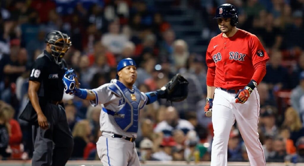 Boston Red Sox' J.D. Martinez walks back to dugout after strikeout vs. Kansas City Royals. 