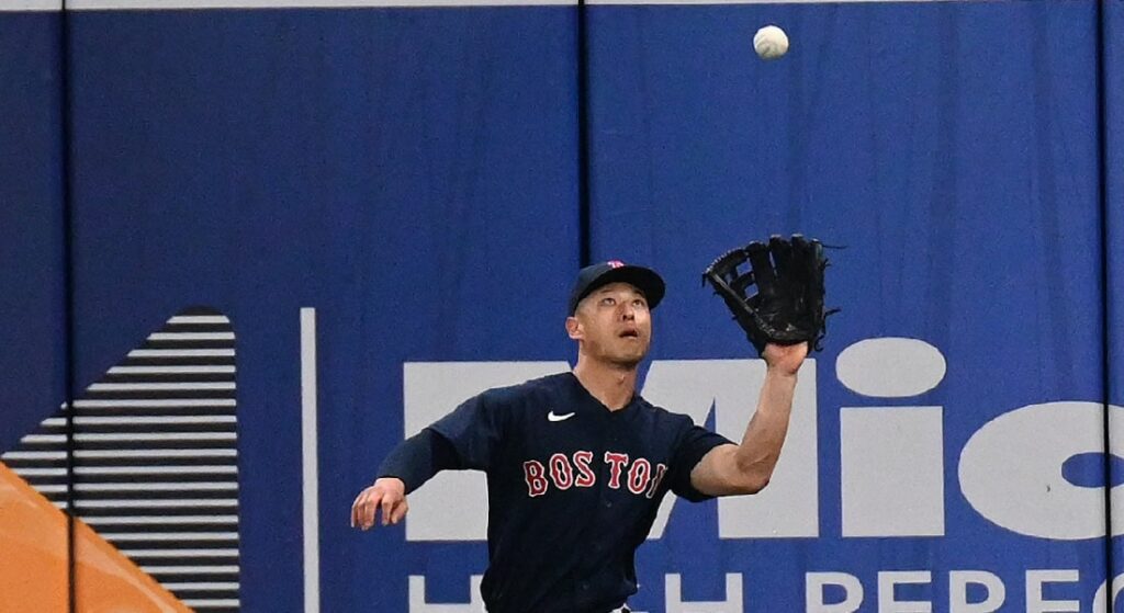 Rob Refsnyder making a catch for the Red Sox in the outfield. 