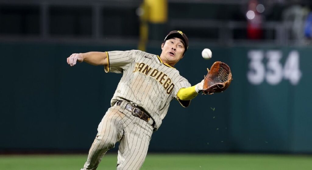 Padres infielder Ha-Seong Kim, a possible Red Sox trade target, makes a difficult play. 