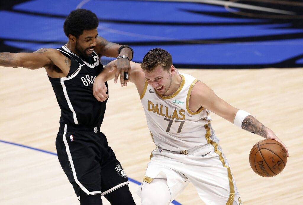 Kyrie Irving defending Luka Doncic.
