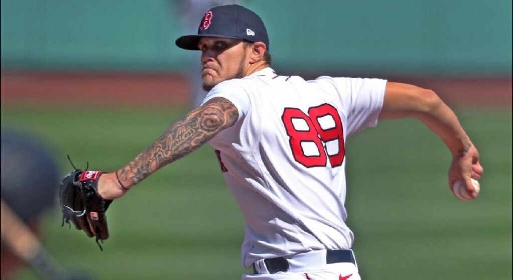 Tanner Houck's career game as a starter doesn't suddenly make him one. Pictured: Houck on the mound at Fenway Park in Red Sox home white jerseys. 