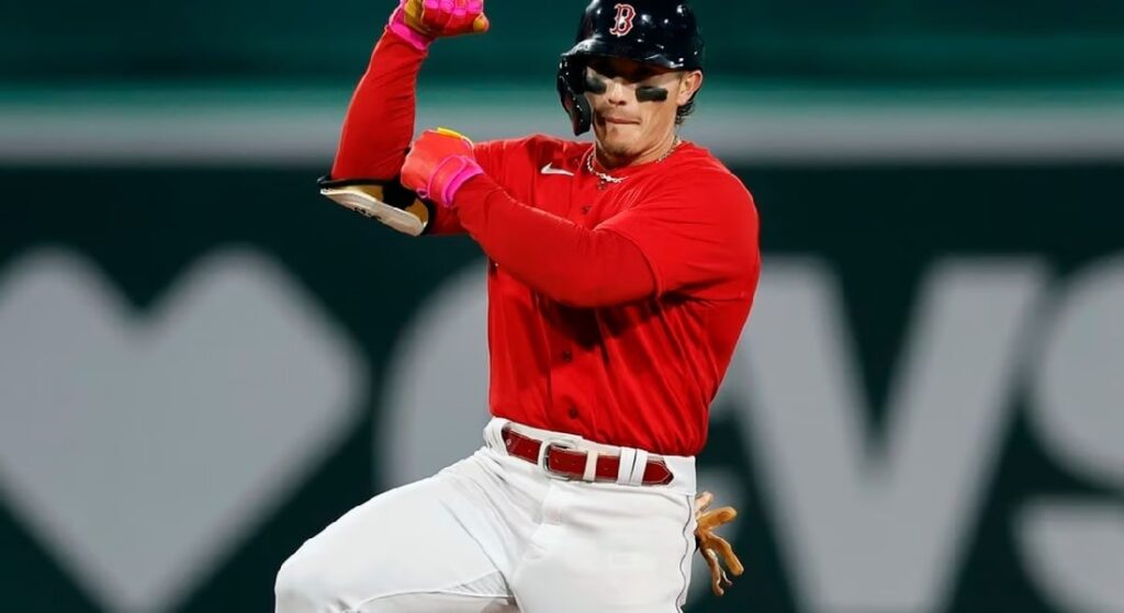 Red Sox Jarren Duran in the 2023 team's signature pose, a perfect encapsulation of Duran's success this season. 